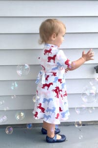 The children's version of the Meghan Wrap; a gorgeous childrens wrap dress pattern that can be made in three different lengths for different styles and occasions!