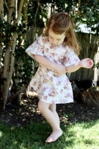 This lovely newborn to 12 years sized Portia party dress pattern can be made in 4 lengths, with 2 back finishes, and in either woven or knit fabric!