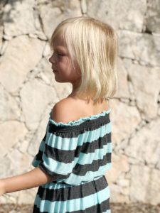 Eloise, the childrens off the shoulder maxi sewing pattern is a breezy swimwear cover up, a sweet summertime dress, and even a special-occasion maxi.